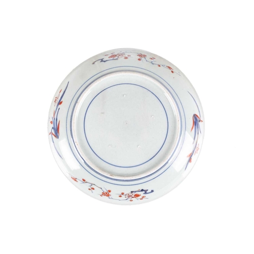 112 - A Japanese Imari porcelain circular dish, Edo period,1st quarter of the 19th century, painted in the... 