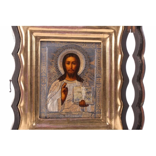 246 - A Russian Christ Pantocrator icon, late 19th century, with pierced and engraved and gilt white metal... 