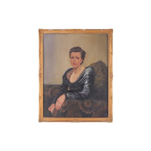 37 - Early 20th-century British school, a half-length portrait of a lady in a blue dress, oil on canvas, ... 
