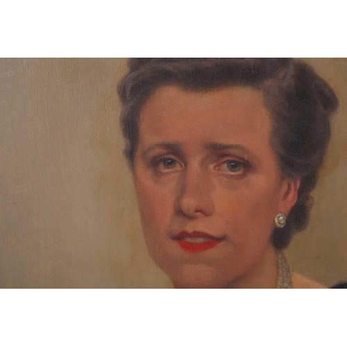 37 - Early 20th-century British school, a half-length portrait of a lady in a blue dress, oil on canvas, ... 