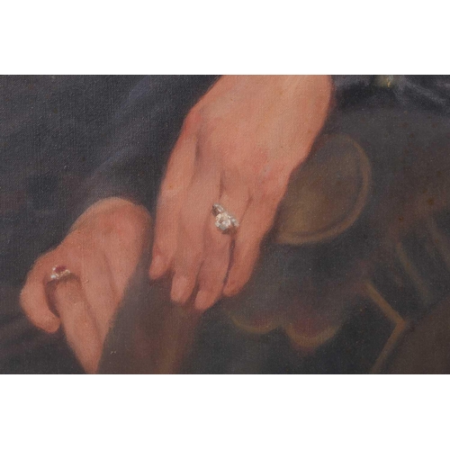 37 - Early 20th-century British school, a half-length portrait of a lady in a blue dress, oil on canvas, ... 