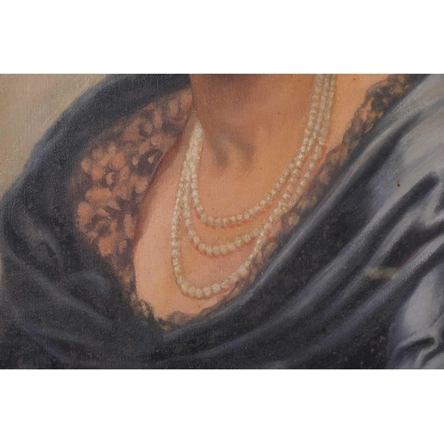 37 - Early 20th-century British school, a half-length portrait of a lady in a blue dress, oil on canvas, ... 