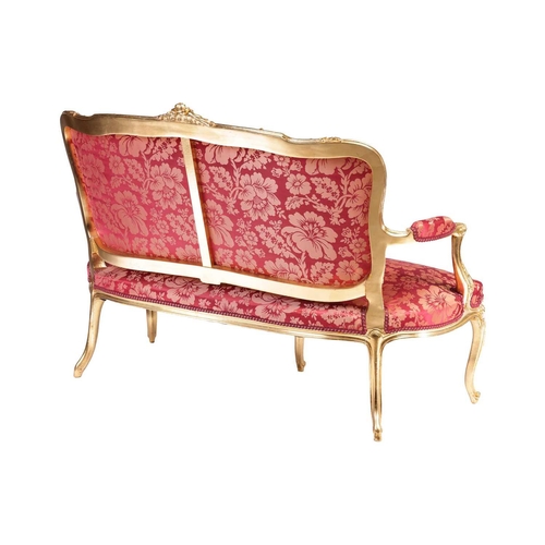 164 - A 20th century Louis XV-style canape settee, with carved and molded wood and gilt gesso outline, stu... 