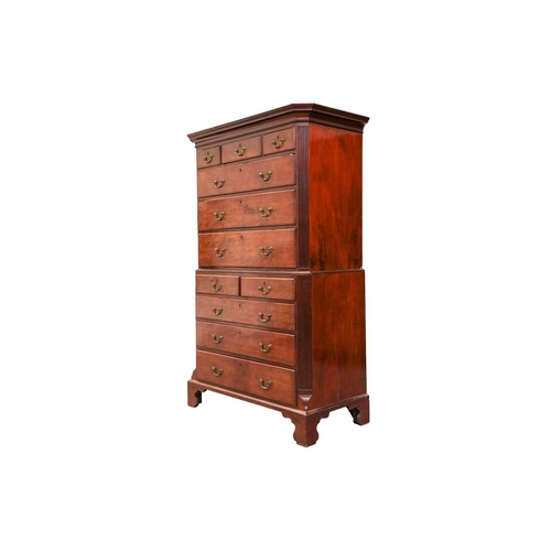 169 - A George III mahogany chest on chest with canted and fluted corners, the upper carcass with three sh... 