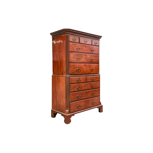 169 - A George III mahogany chest on chest with canted and fluted corners, the upper carcass with three sh... 