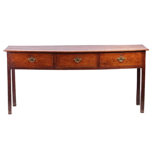 170 - A 19th-century Welsh borders oak dresser base, with quartered planked top over three short drawers, ... 