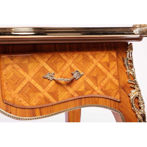 175 - A 20th century Louis XV style cartouche topped bureau plat with tooled leather insert, gilt metal mo... 