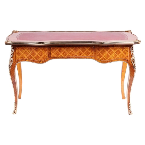 175 - A 20th century Louis XV style cartouche topped bureau plat with tooled leather insert, gilt metal mo... 