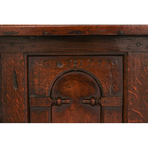 176 - An 18th century Wesh oak Cwpwrdd Tridarn cupboard with open hutch top over a middle tier of shaped p... 