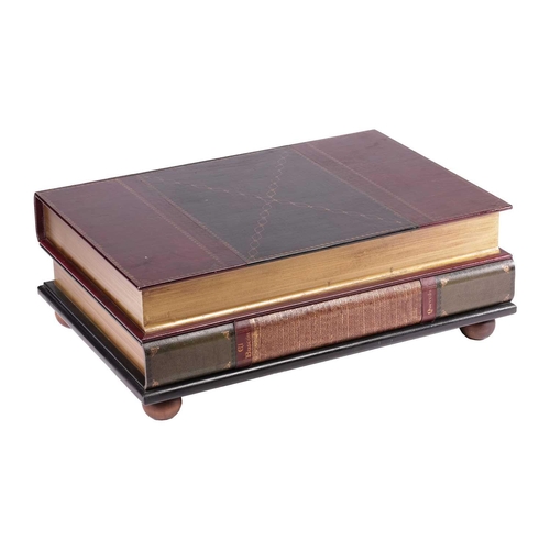 180 - A large rectangular coffee table in the form of two oversized faux leather-bound books, with a singl... 