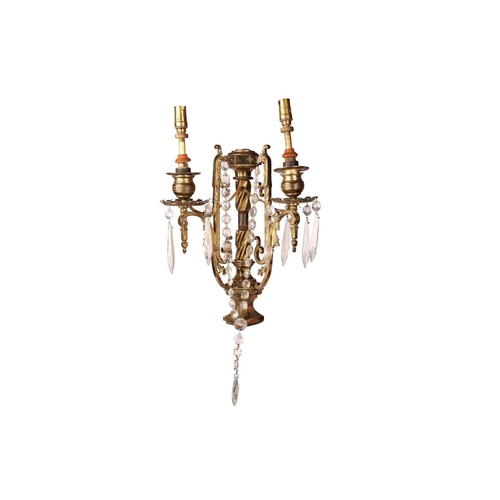 188 - A pair Neo neo-classical gilt brass two-sconce wall lights with central columns, each branch with br... 