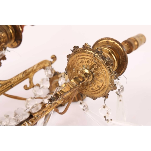 188 - A pair Neo neo-classical gilt brass two-sconce wall lights with central columns, each branch with br... 