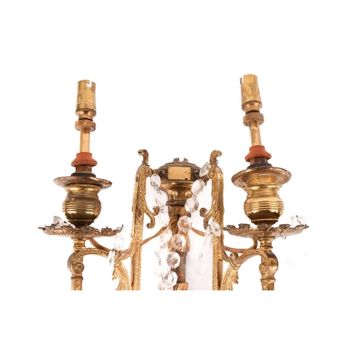 188 - A pair Neo neo-classical gilt brass two-sconce wall lights with central columns, each branch with br... 