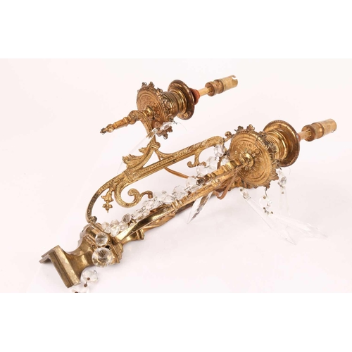 188 - A pair Neo neo-classical gilt brass two-sconce wall lights with central columns, each branch with br... 