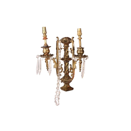 188 - A pair Neo neo-classical gilt brass two-sconce wall lights with central columns, each branch with br... 