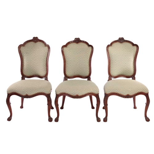 193 - A set of seven George II style walnut cartouch backed dining chairs, possibly Irish C1900, the set c... 