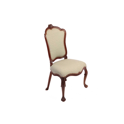 193 - A set of seven George II style walnut cartouch backed dining chairs, possibly Irish C1900, the set c... 