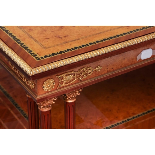 194 - A 20th century Louis XVI style rectangular topped side table, with boss and anthemion inlaid top, an... 