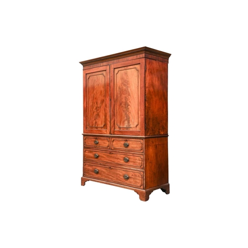 196 - A George III mahogany two-door linen press, now converted for hanging, retaining the long bottom dra... 