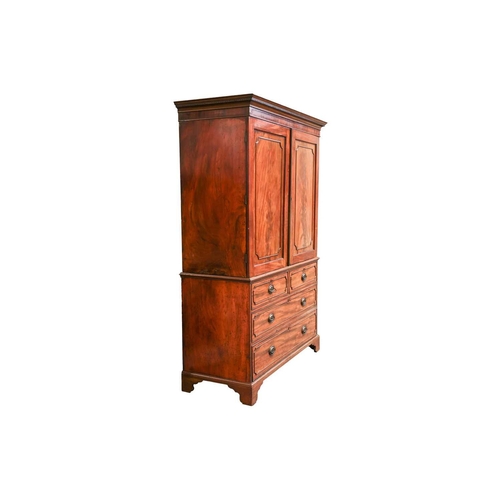 196 - A George III mahogany two-door linen press, now converted for hanging, retaining the long bottom dra... 