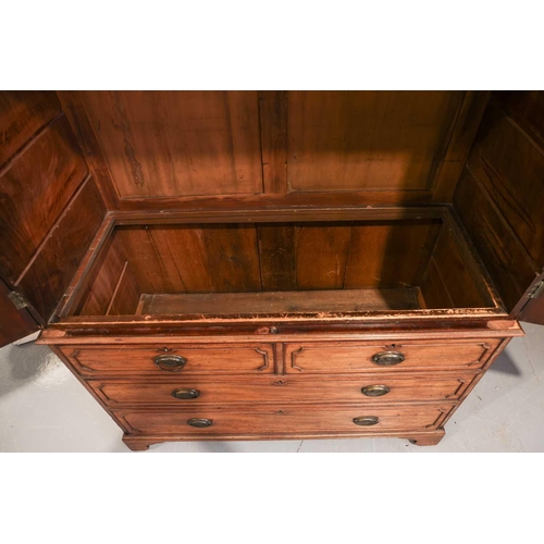 196 - A George III mahogany two-door linen press, now converted for hanging, retaining the long bottom dra... 