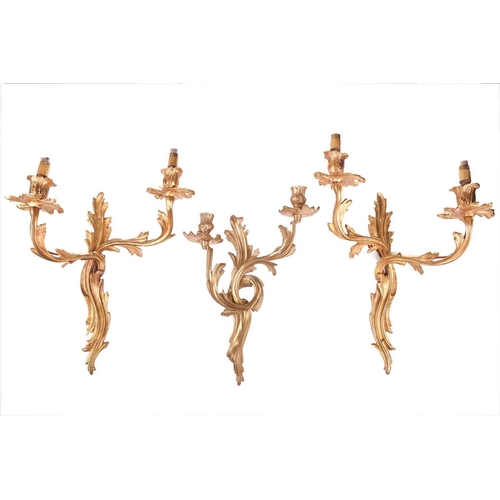 211 - A pair of Louis XV-style ormolu effect double sconce wall lights with foliate scroll arms and drip p... 