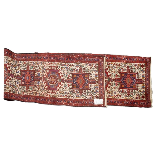 219 - A reg ground Shiraz rug with three stepped diamonds on a centralm pole,160 cm x 123 cm, together wit... 