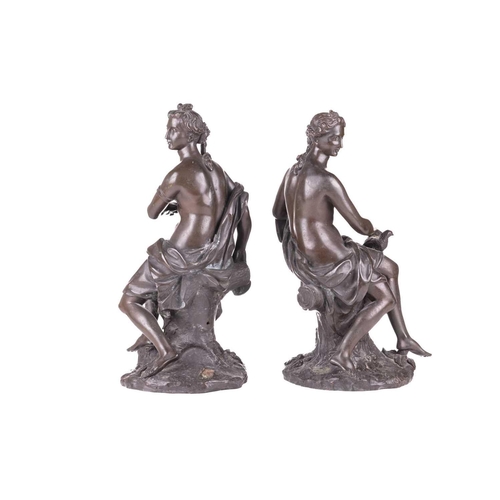 225 - After Guillaume Coustou, a pair of seated Allegorical figures, one signed Coustou, bronze, 39 cm hig... 