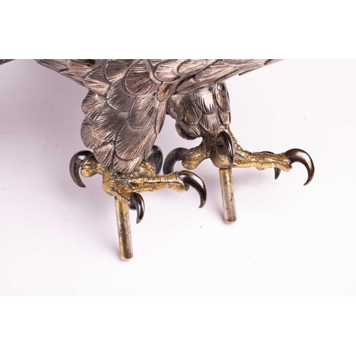 235 - Genryusai Seiya; a Japanese silvered bronze okimono of a sea eagle, Meiji period late 19th century, ... 