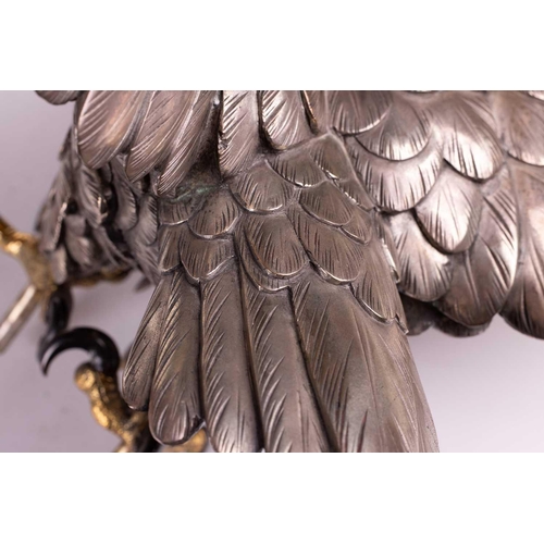 235 - Genryusai Seiya; a Japanese silvered bronze okimono of a sea eagle, Meiji period late 19th century, ... 