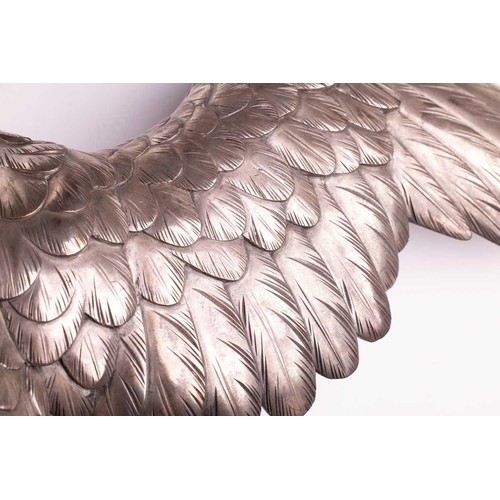 235 - Genryusai Seiya; a Japanese silvered bronze okimono of a sea eagle, Meiji period late 19th century, ... 