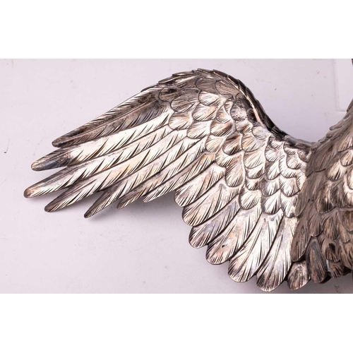 235 - Genryusai Seiya; a Japanese silvered bronze okimono of a sea eagle, Meiji period late 19th century, ... 