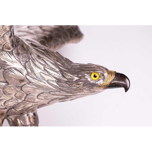 235 - Genryusai Seiya; a Japanese silvered bronze okimono of a sea eagle, Meiji period late 19th century, ... 