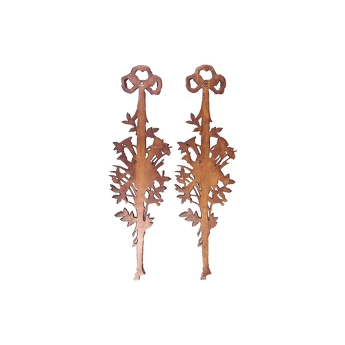 236 - A pair of 20th-century Louis XVI style, wood effect composition wall appliques, each with tied ribbo... 