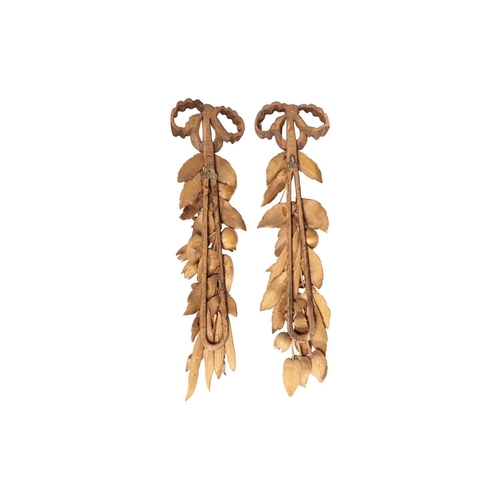 237 - In the style of Grinling Gibbons, a pair of 20th century well-carved limewood fireplace appliques, c... 