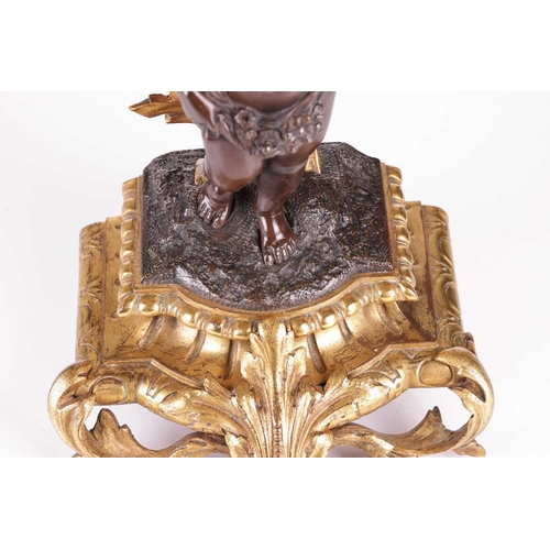 239 - A pair of French ormolu and bronze figural six-sconce candelabra in the manner of Auguste Moreau a p... 