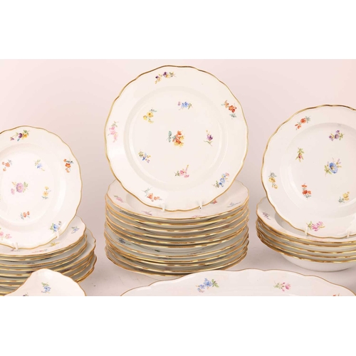 247 - A Meissen porcelain part dinner service painted with 'Deutsche Blumen' sprays, first half of the 20t... 