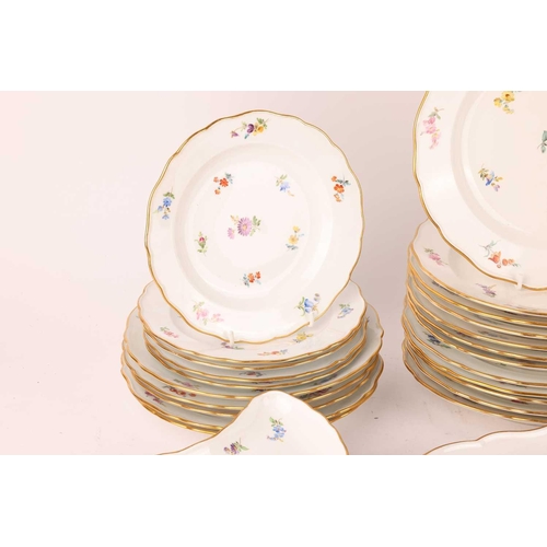 247 - A Meissen porcelain part dinner service painted with 'Deutsche Blumen' sprays, first half of the 20t... 