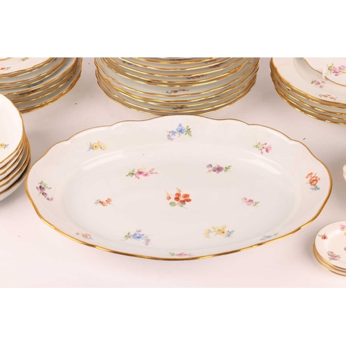 247 - A Meissen porcelain part dinner service painted with 'Deutsche Blumen' sprays, first half of the 20t... 