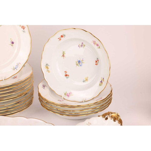 247 - A Meissen porcelain part dinner service painted with 'Deutsche Blumen' sprays, first half of the 20t... 