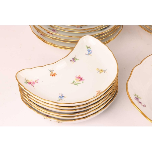 247 - A Meissen porcelain part dinner service painted with 'Deutsche Blumen' sprays, first half of the 20t... 