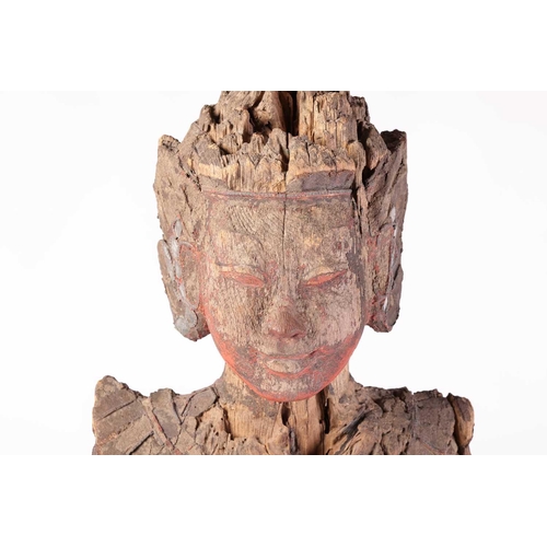 38 - A large Burmese carved wood and mirror set temple figure of a Nat (protective spirit), late 17th/ear... 