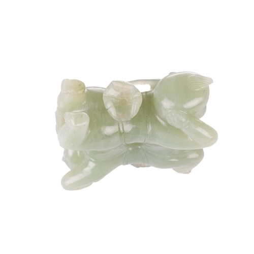 57 - A large Chinese green jade carving of two laughing Buddhai, each figure supported on the back of his... 