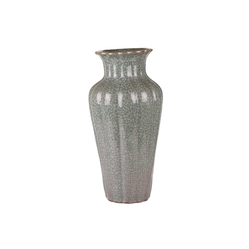 67 - A large Korean celadon green crackle glazed baluster vase, early 20th century, with a fluted body an... 