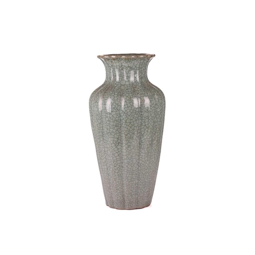 67 - A large Korean celadon green crackle glazed baluster vase, early 20th century, with a fluted body an... 