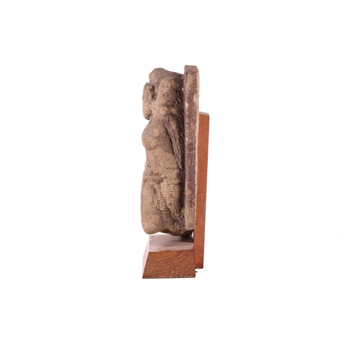 74 - An Indian-carved sandstone architectural fragment, of Parvati dancing, probably 12th century 14 cm w... 