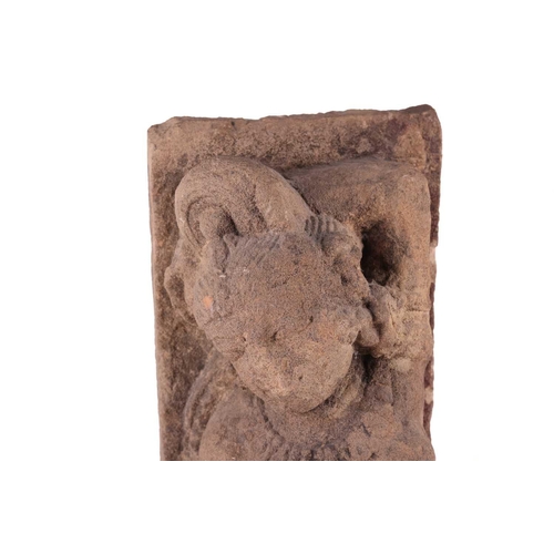 74 - An Indian-carved sandstone architectural fragment, of Parvati dancing, probably 12th century 14 cm w... 