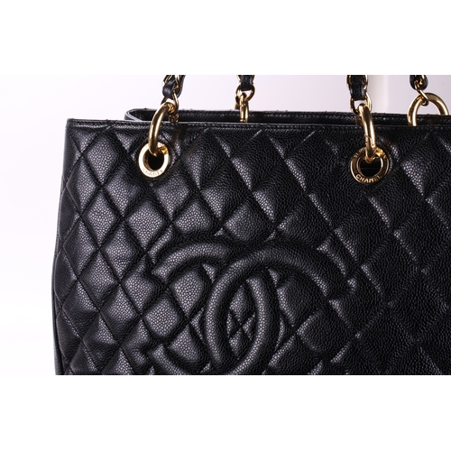 266 - Chanel - a Grand Shopping Tote in black diamond-quilted caviar leather, circa 2014, structured recta... 