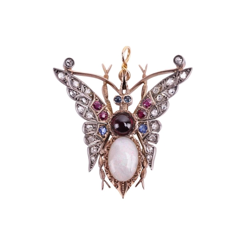 10 - A Victorian opal, garnet, diamond, ruby and sapphire set butterfly pendant. The oval cabochon opal m... 