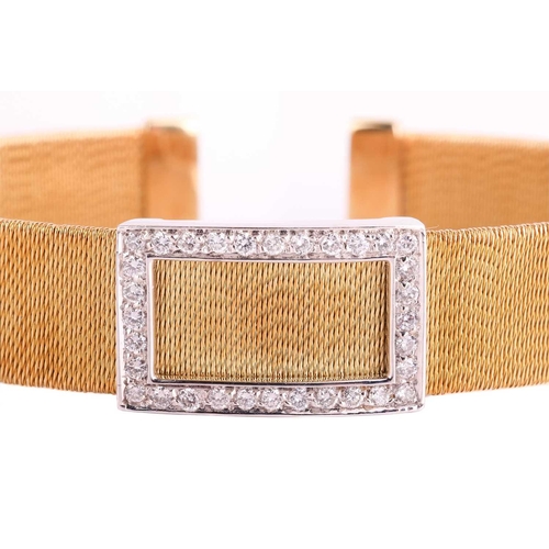 100 - Moussaieff - a diamond set cuff bangle, featuring a rectangular buckle with a border of round brilli... 